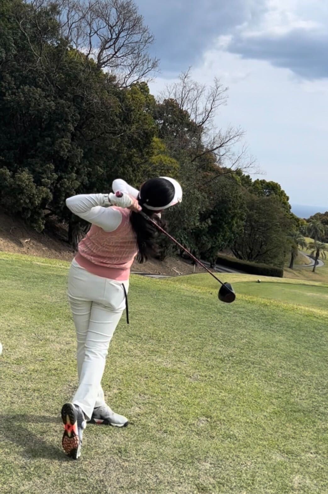 Close-up of skilled hands sewing high-quality fabric with precision